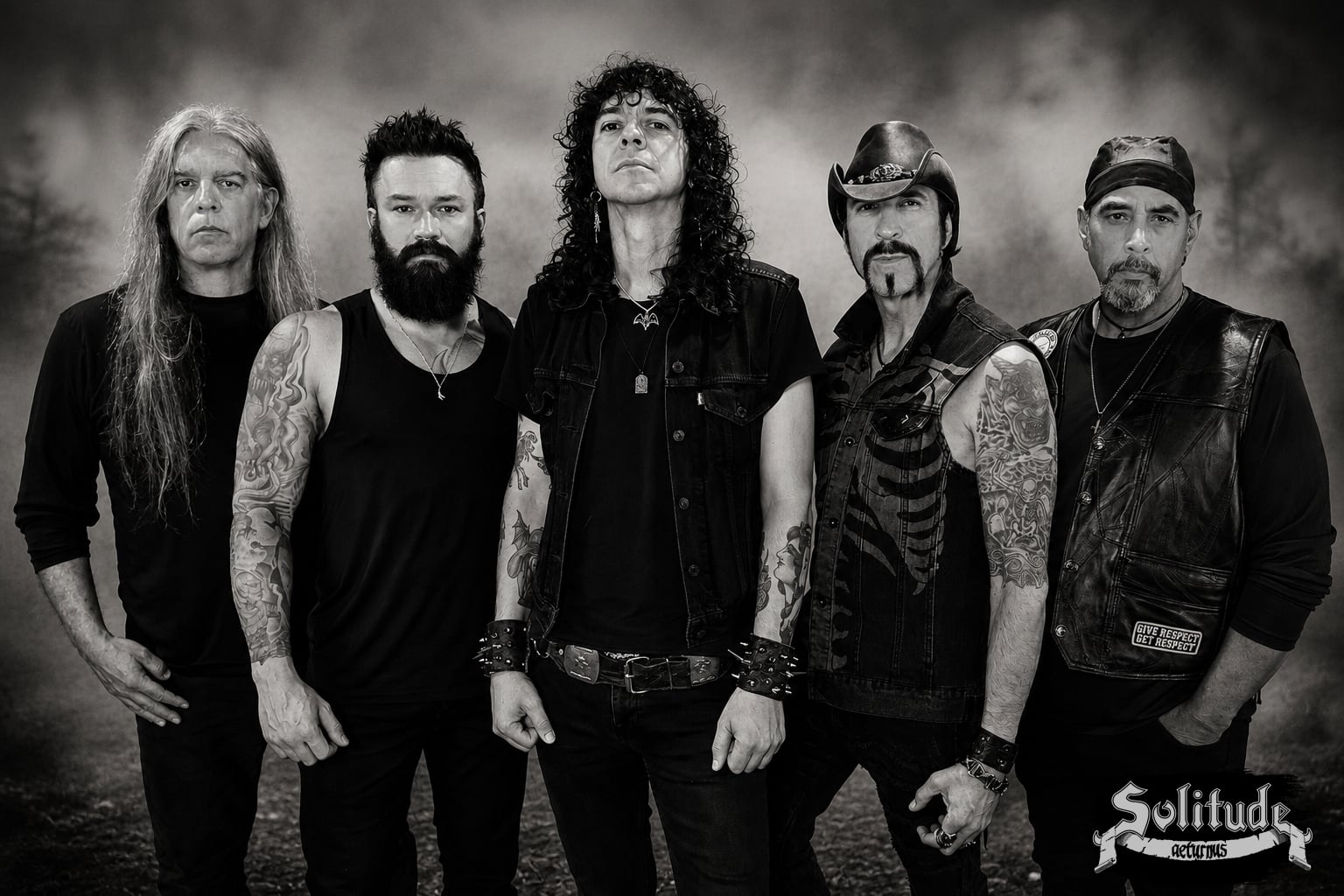 Solitude Aeturnus in black and white, standing in mist. Left to right: John Perez, Logan Cade, James-Paul Luna, Lyle Blackburn, Edgar Rivera.
